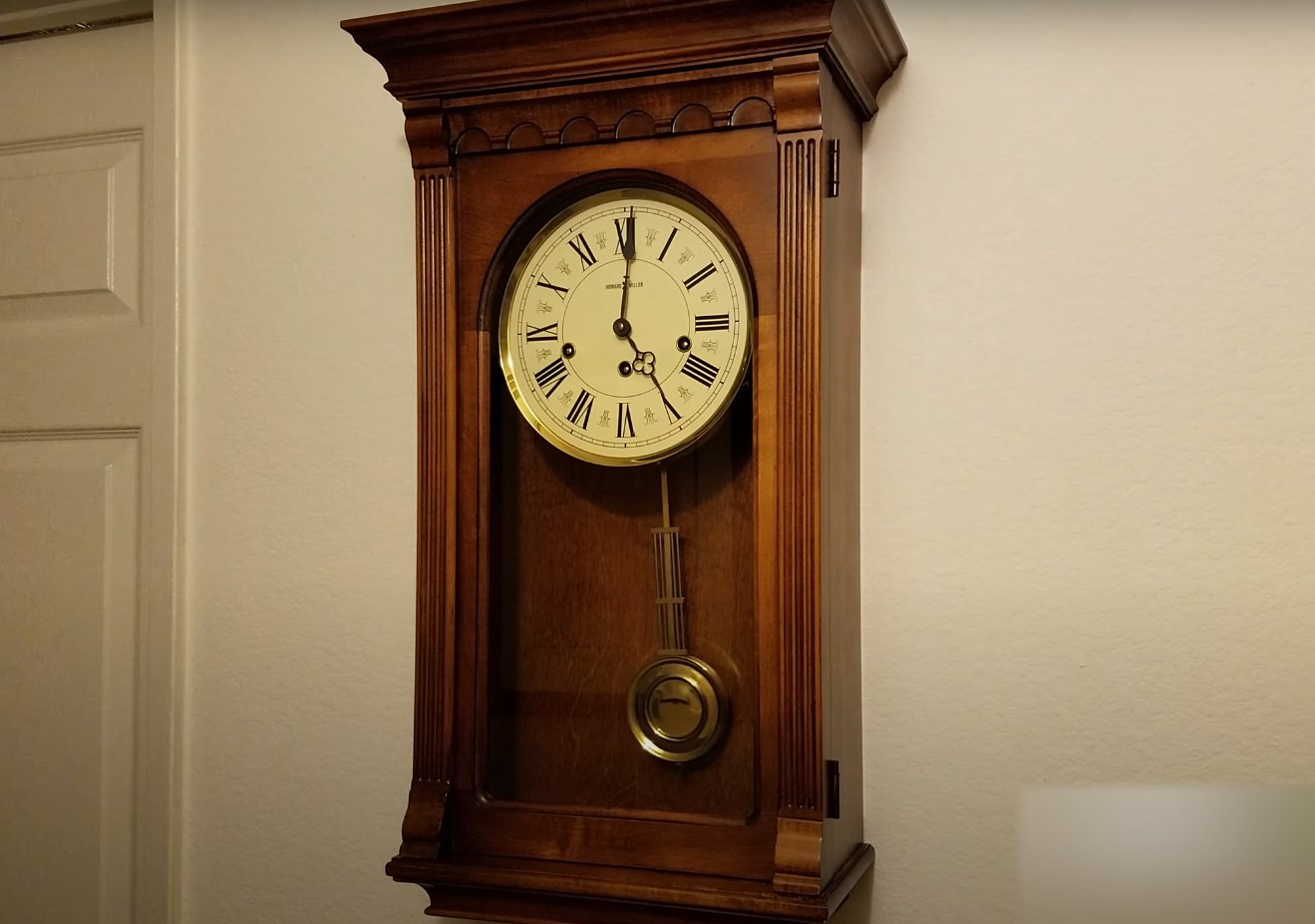 a vintage Howard Miller wall clock