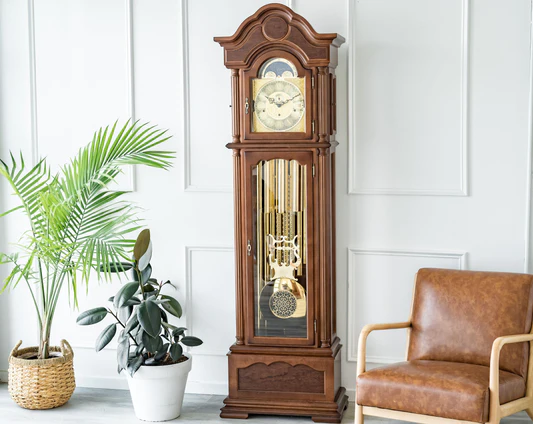 An antique clock stands in a room