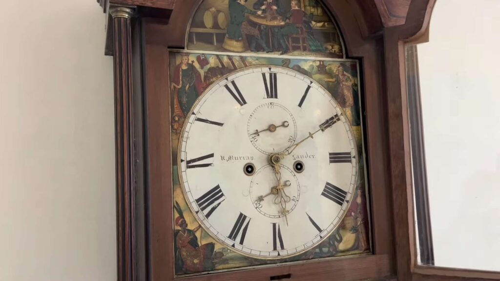 Close up of parts of a grandfather clock